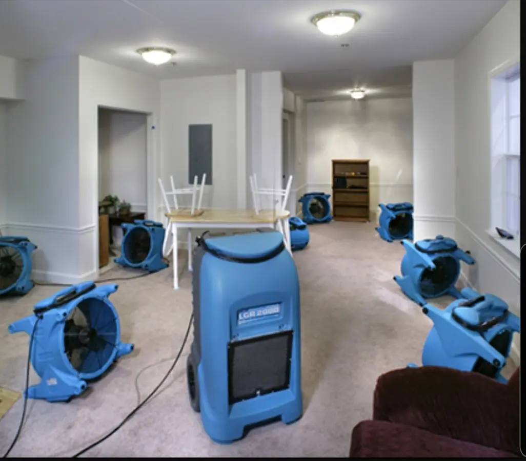 Air movers and dehumidifier setup for Water Damage Restoration in Upper Milford